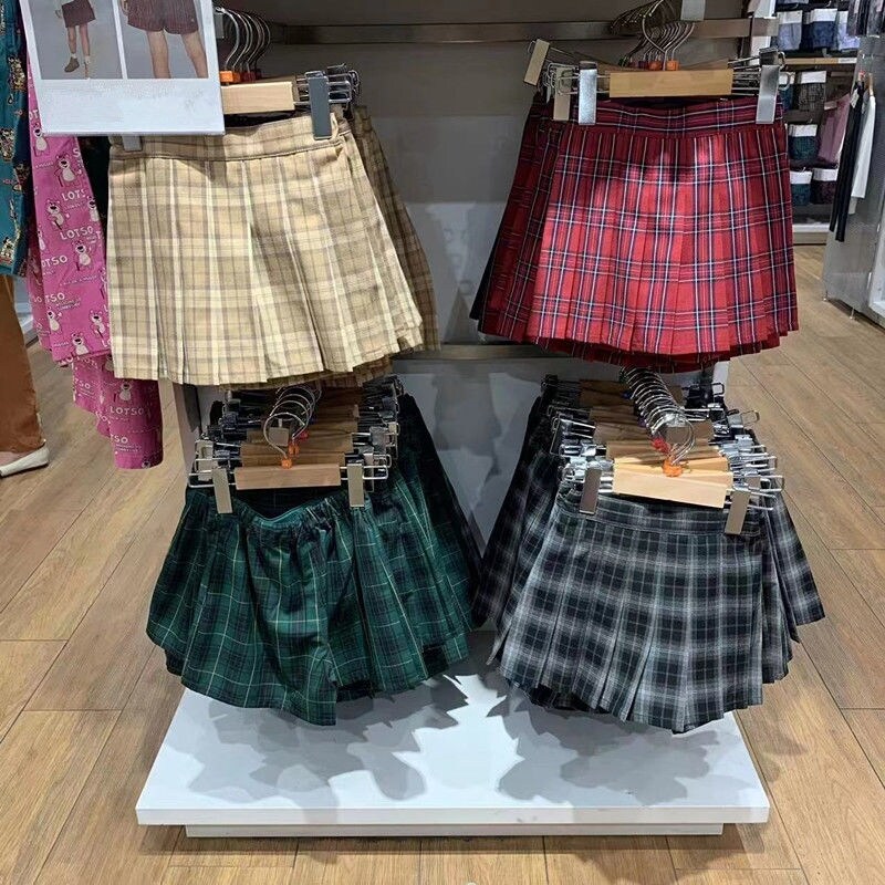 UNIQLO เสื้อผ้าเด็กในฤดูใบไม้ร่วงห้องลองเสื้อสำหรับเด็กผู้หญิงและเด็กผู้หญิงลายสก๊อตจีบกระโปรงสไตล์มหาลัยกระโปรงทรงเอลายตารางหมากรุก R460668 ราคา  698 บาท*ส่งฟรี