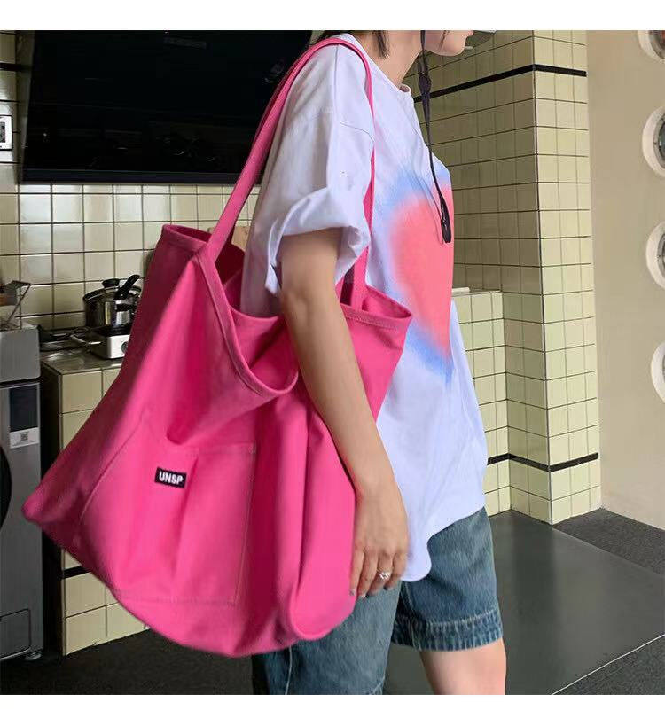 Solid color canvas bag 2021 New ins women's bag large capacity simple female student Korean style one shoulder literary shoulder bag