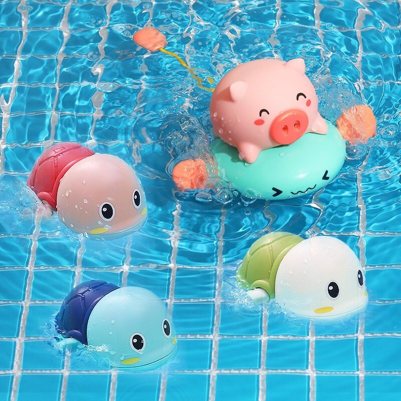 Đồ chơi hình thú bơi trong nước cho bé