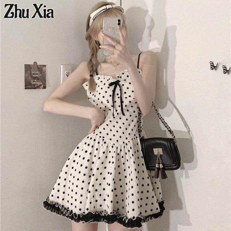 Zhu xia đầm ôm eo thắt nút váy yếm cung mới chấm bi ngọt ngào cho nữ dây đai quần ren váy yếm