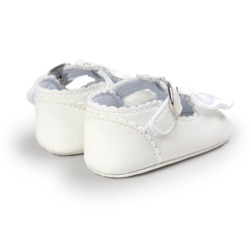 ใหม่เด็กทารกแรกเกิดเพศหญิงรองเท้าโบว์หนัง PU Buckle First Walkers พื้นรองเท้านุ่มลื่นรองเท้าเตียงนอนเด็กรองเท้า0-18M