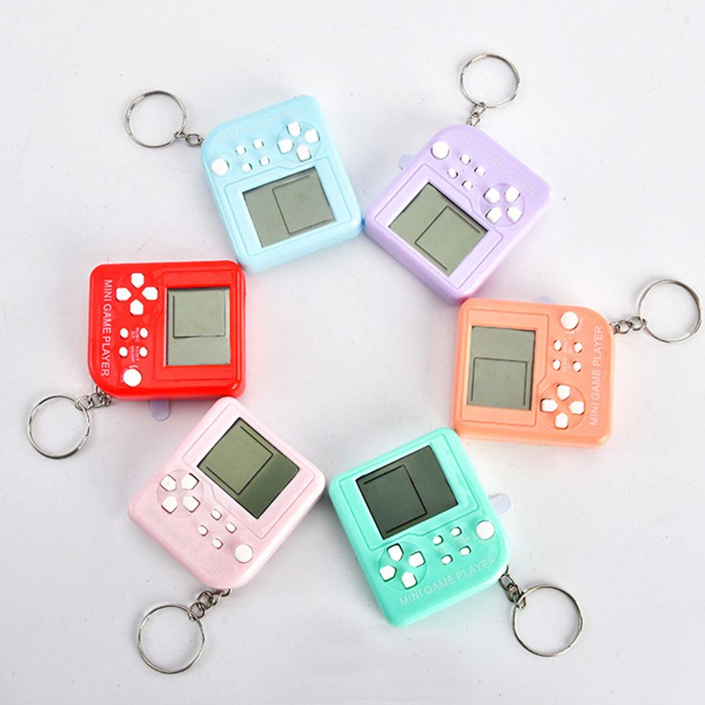 Máy chơi game mini máy chơi game mini hoài cổ cầm tay cho trẻ em kèm móc khóa quà tặng trẻ em