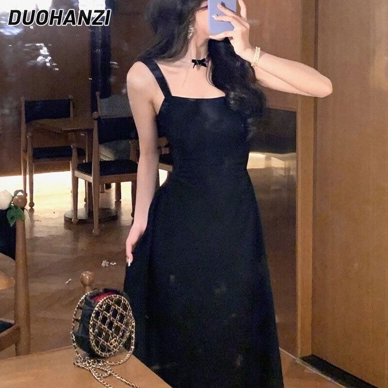 DUOHANZI thời trang váy yếm trắng nữ mới A-line pháp eo eo thiết kế chân váy dài