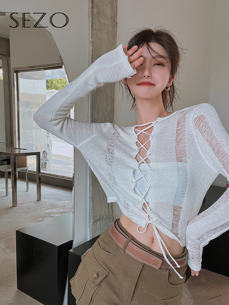 Sezo áo dài tay thắt dây khoét lỗ phong cách hàn quốc cho nữ