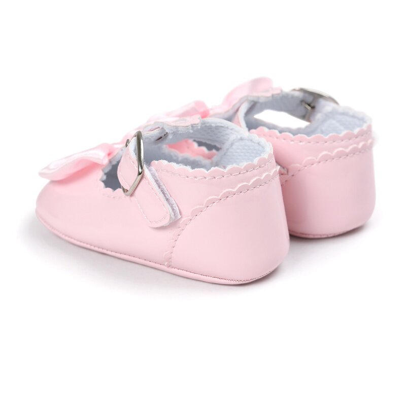 ใหม่เด็กทารกแรกเกิดเพศหญิงรองเท้าโบว์หนัง PU Buckle First Walkers พื้นรองเท้านุ่มลื่นรองเท้าเตียงนอนเด็กรองเท้า0-18M