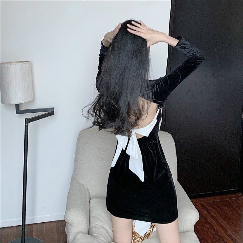 Đầm nhung đen phối cột nơ lưng trắng
