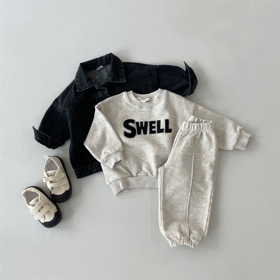 Mùa thu đông Áo Sweatshirt rộng mới bé trai thời trang áo thể thao bé gái quần áo áo có mũ chui đầu cotton đơn giản dễ phối