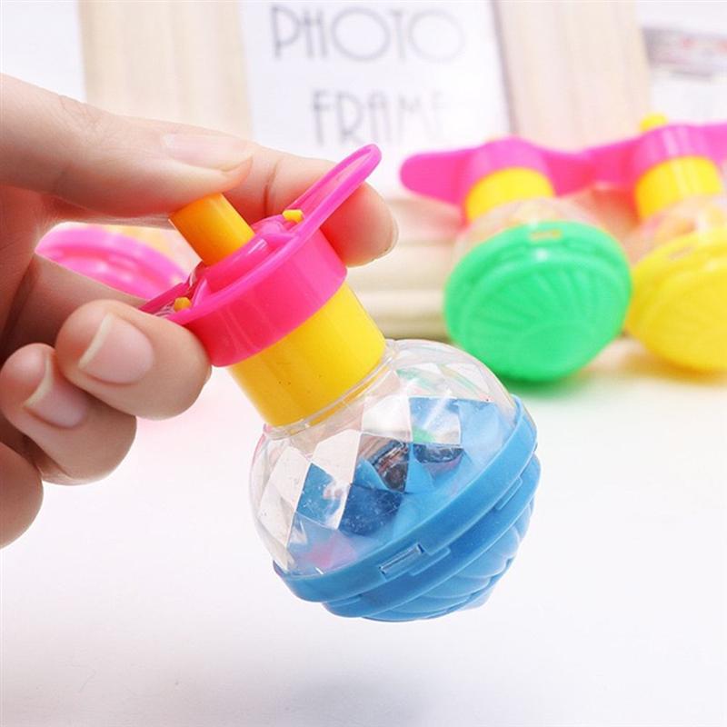 Đèn led điện quay đầu đèn nhấp nháy đồ chơi phát sáng dành cho trẻ em đồ chơi con quay hồi chuyển phát sáng vào ban đêm đồ chơi trẻ em quay