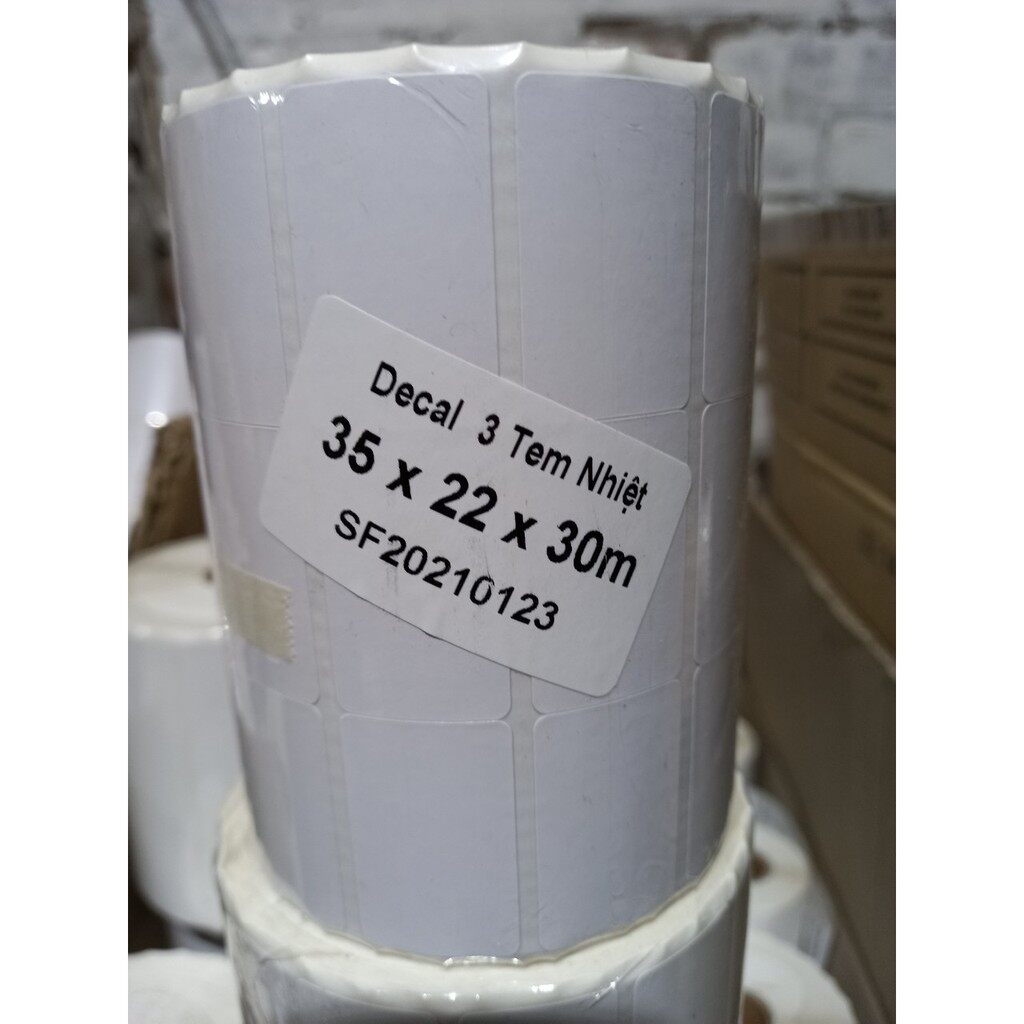 Giấy in nhiệt .tem in mã vạch 35x22x30m 1 hàng 3 tem nhiệt