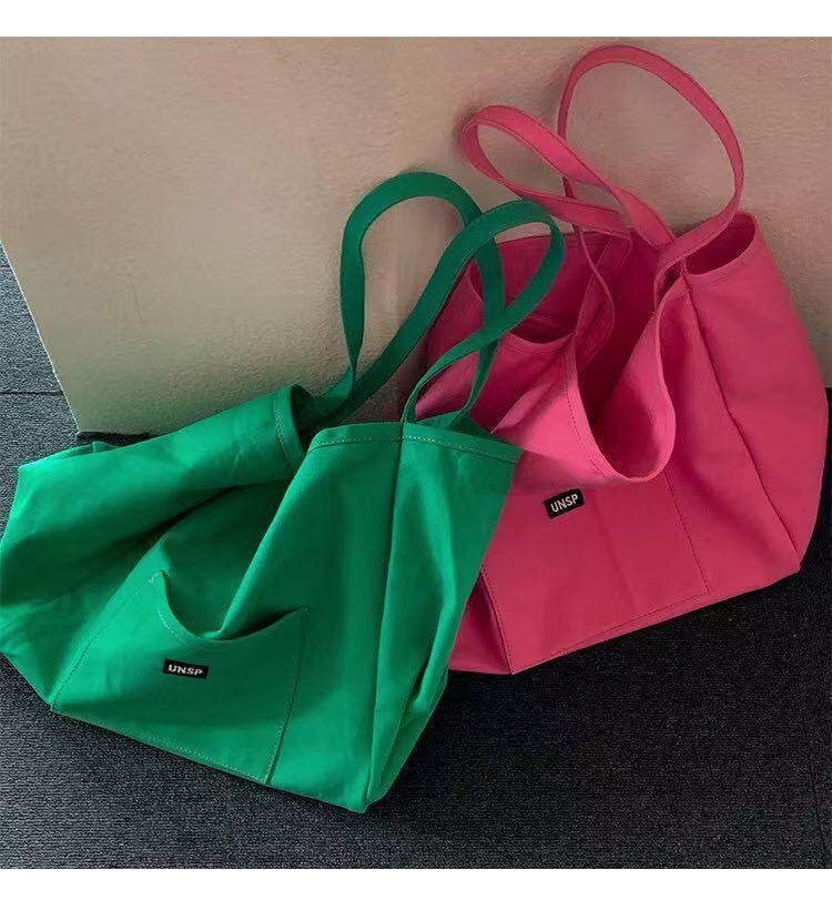 Solid color canvas bag 2021 New ins women's bag large capacity simple female student Korean style one shoulder literary shoulder bag