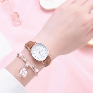 ภาพหน้าปกสินค้าFJSL นาฬิกานักเรียนสด สุภาพสตรี นาฬิกาข้อมือคู่สายเข็มขัดแฟชั่น ของขวัญวันเกิดที่สวยงาม ที่เกี่ยวข้อง