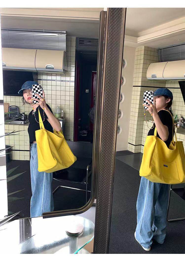 Solid color canvas bag 2021 New ins women's bag large capacity simple female student Korean style one shoulder literary shoulder bag