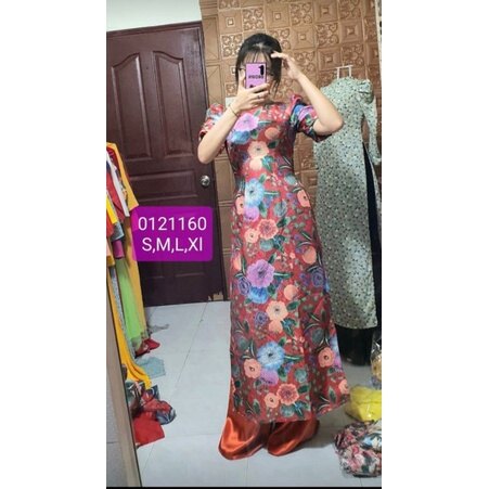 Áo dài gấm nỗi hoa