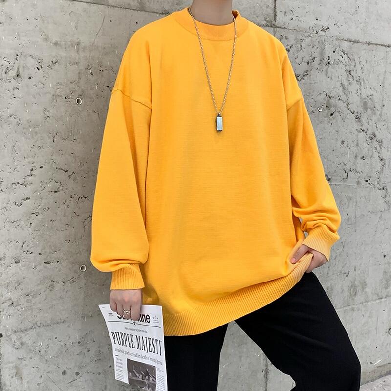 yellow pullover sweater