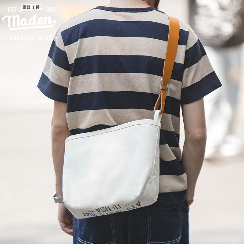 Maden brand tooling style 2023 new limited edition men young gentleman American retro mother-and-child printing tool bag literary fan men simple messenger bag ราคา 1,189 บาท*ส่งฟรี