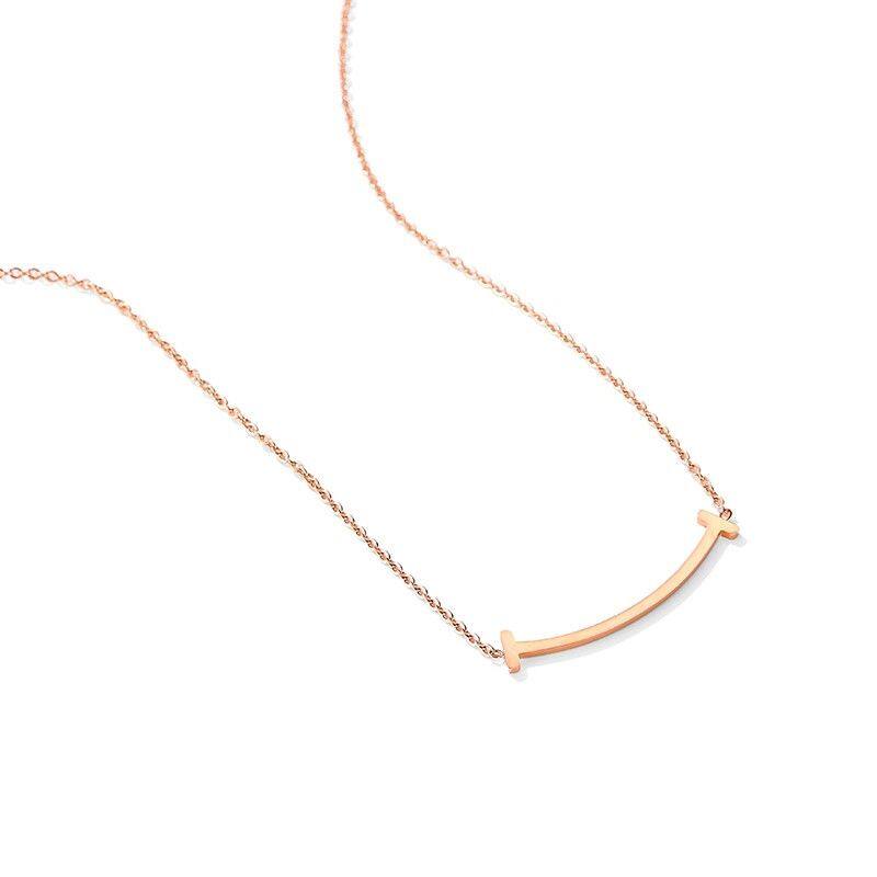 Vòng cổ titan thép màu Nụ cười Motif vàng hồng cho nữ