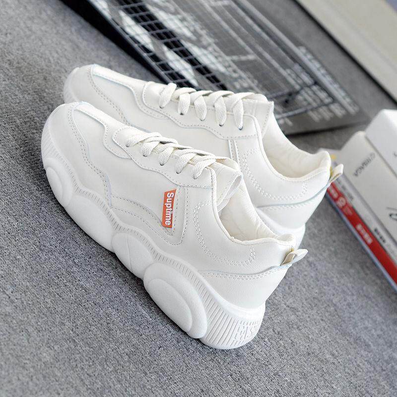 white thick soled tennis shoes